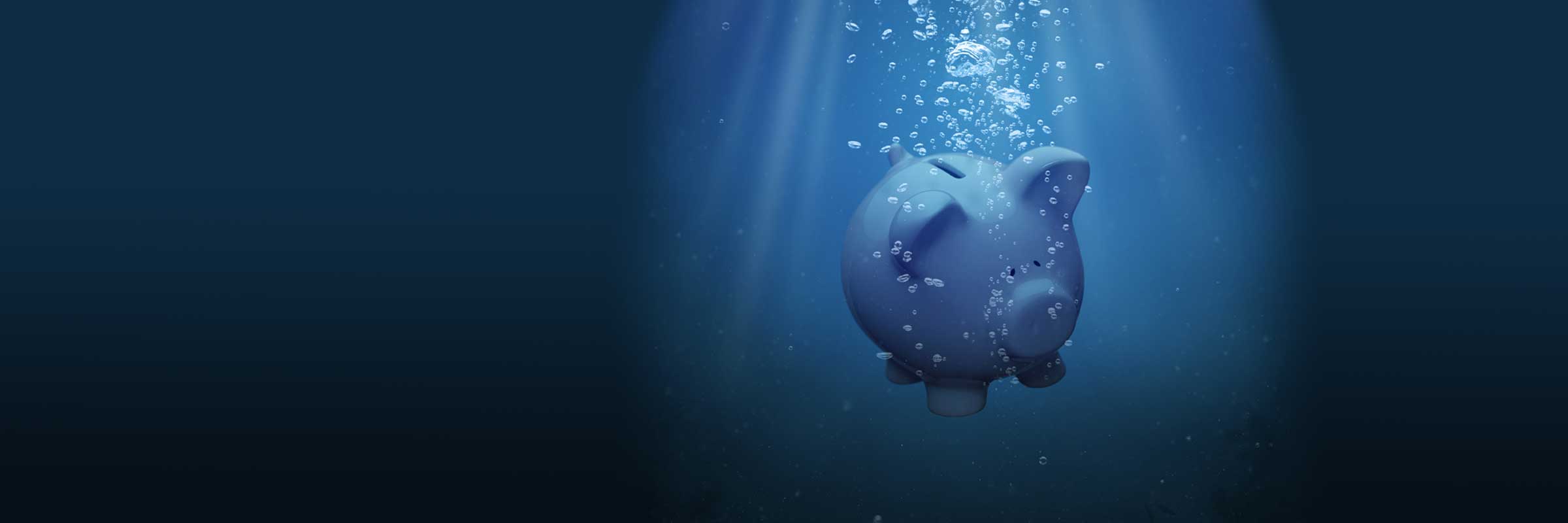 Image of piggy bank sinking in the ocean